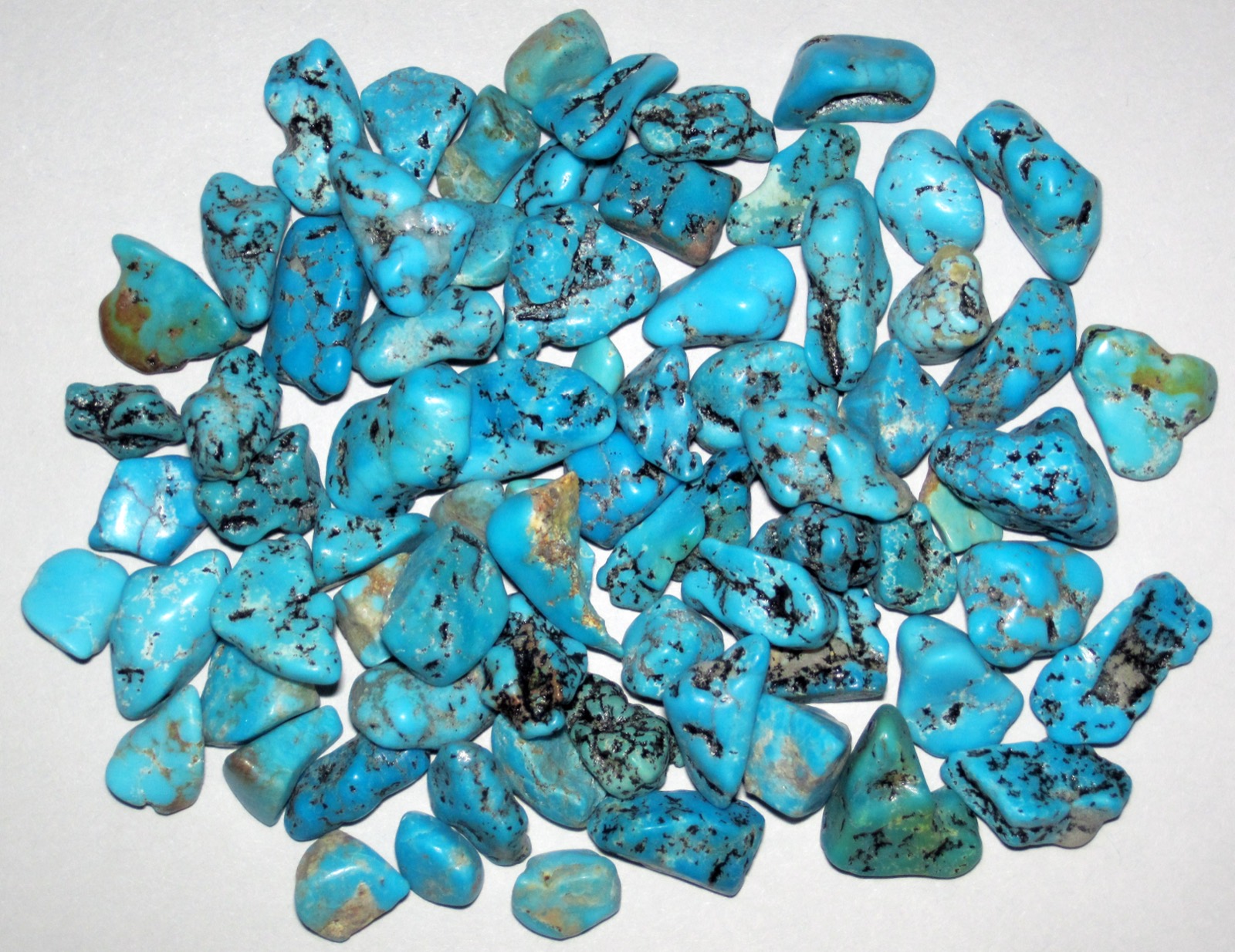 Close-up of Kingman turquoise, robin’s-egg blue with dark matrix veining